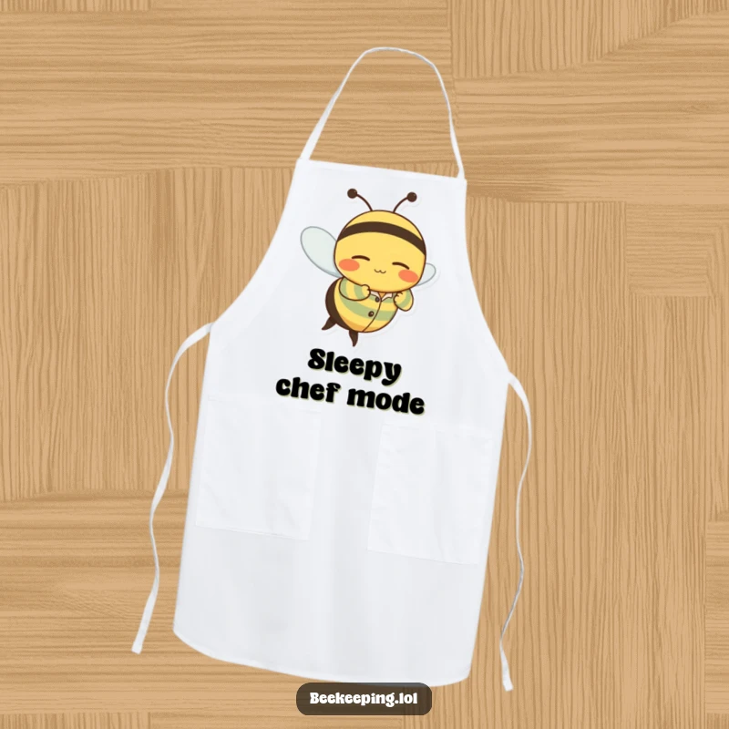 Funny apron showcasing a wobbly bee character in striped pajamas flying with a peaceful, sleepy grin.