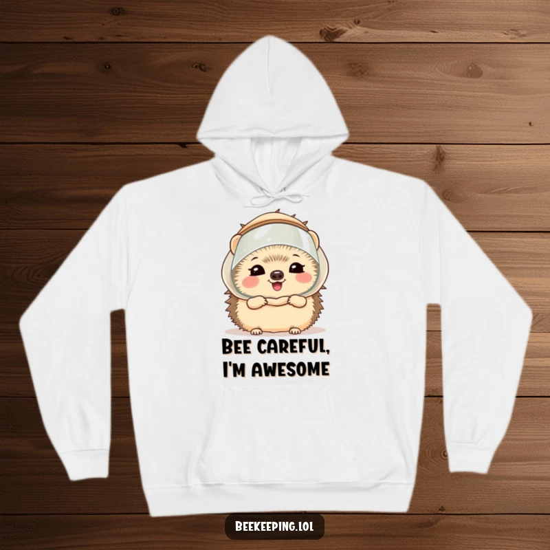 Funny hedgehog in a miniature beekeeper veil, giggling adorably, featured on a warm hoodie, ideal for cozy, humorous wear.