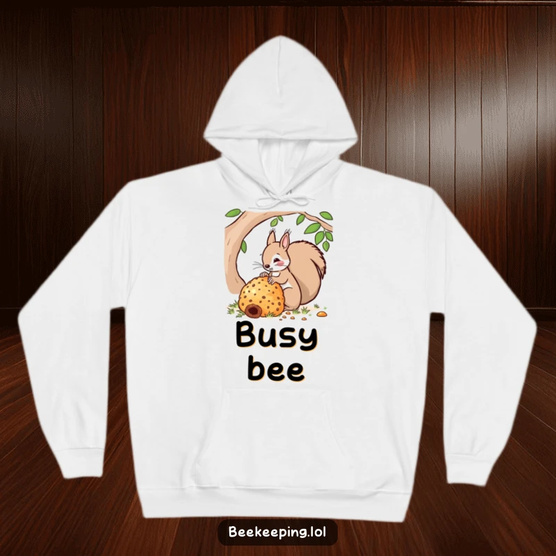 Funny hoodie showcasing a squirrel diligently tending to a very large beehive. Cozy and humorous apparel for all.