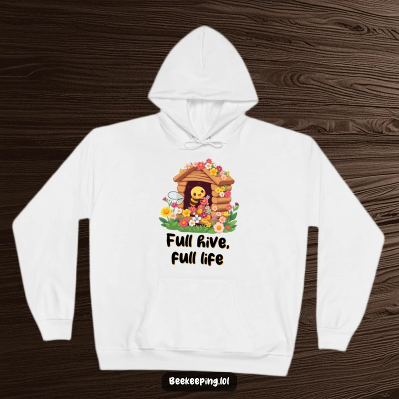 Funny hoodie featuring a vibrant, cheerful busy bee tending to a richly blooming flower hive, looking industrious.