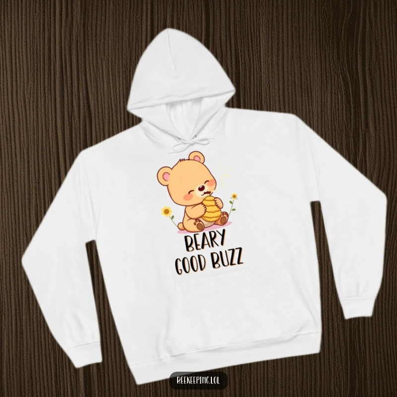 Funny Bear Cub Hoodie: Soft hoodie with a cheerful bear cub gently smoking a small beehive, offering snuggly humor.