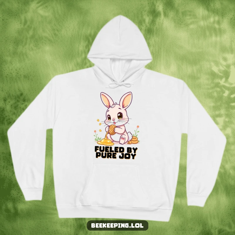 Funny hoodie featuring a cute bunny wide-eyed with wonder while carefully collecting honey.