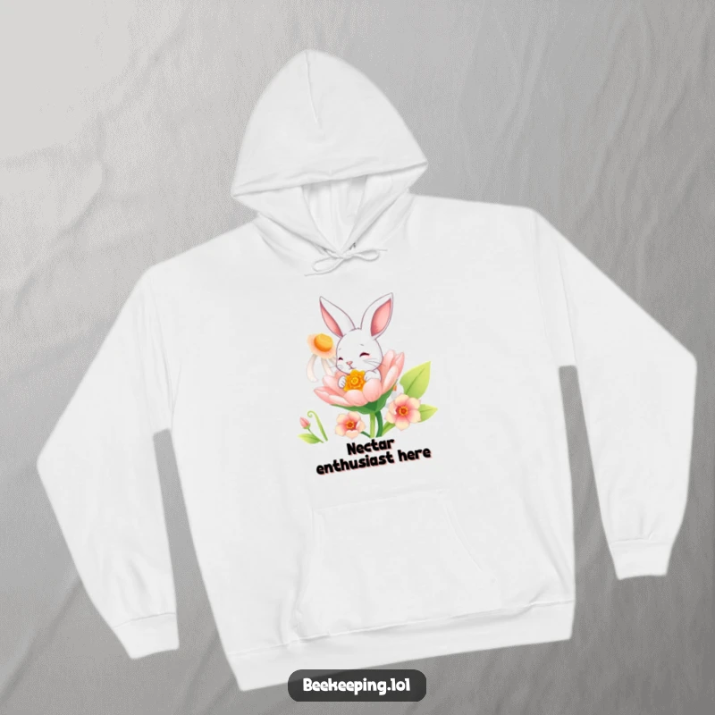 Funny Bunny Hoodie: A soft hoodie featuring a playful bunny enjoying a sweet sip from a large, blooming flower.