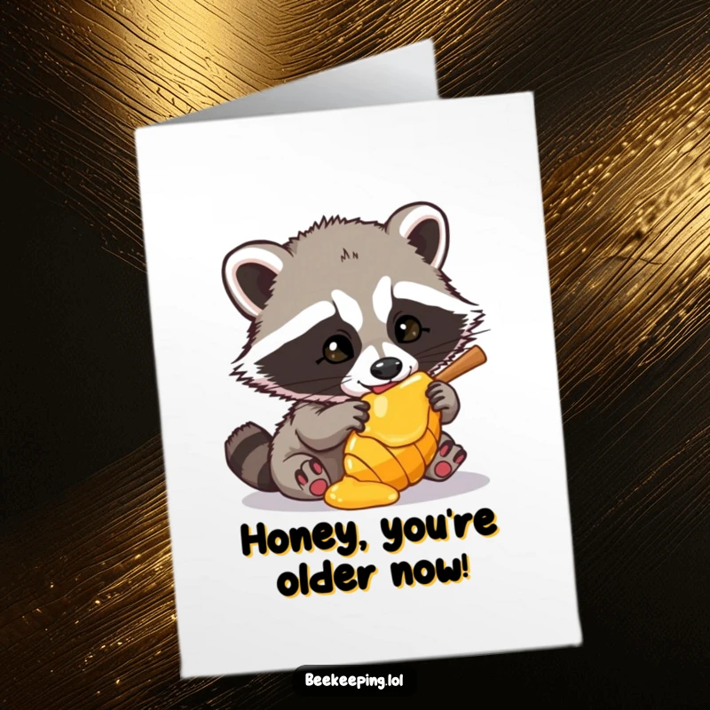 Funny Free Printable Birthday Card illustration of a raccoon caught red-pawed sneaking honey, perfect for downloadable birthday wishes.