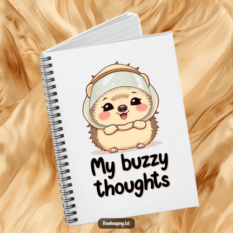 Funny hedgehog wearing a tiny beekeeper veil and giggling, on a notebook cover, inspiring joy for writing and planning.