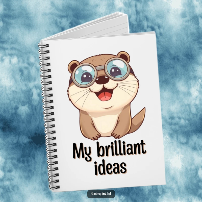 Funny cheerful otter wearing round protective goggles on a notebook, for humorous journaling and ideas.