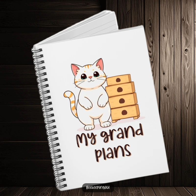 Funny proud cat beside empty beekeeping hives on a notebook, for humorous journaling.