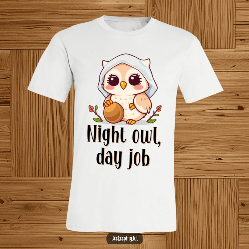 Funny Owl Beekeeper T-Shirt, smiling owl wearing a beekeeper veil, humorously tending to a busy beehive.