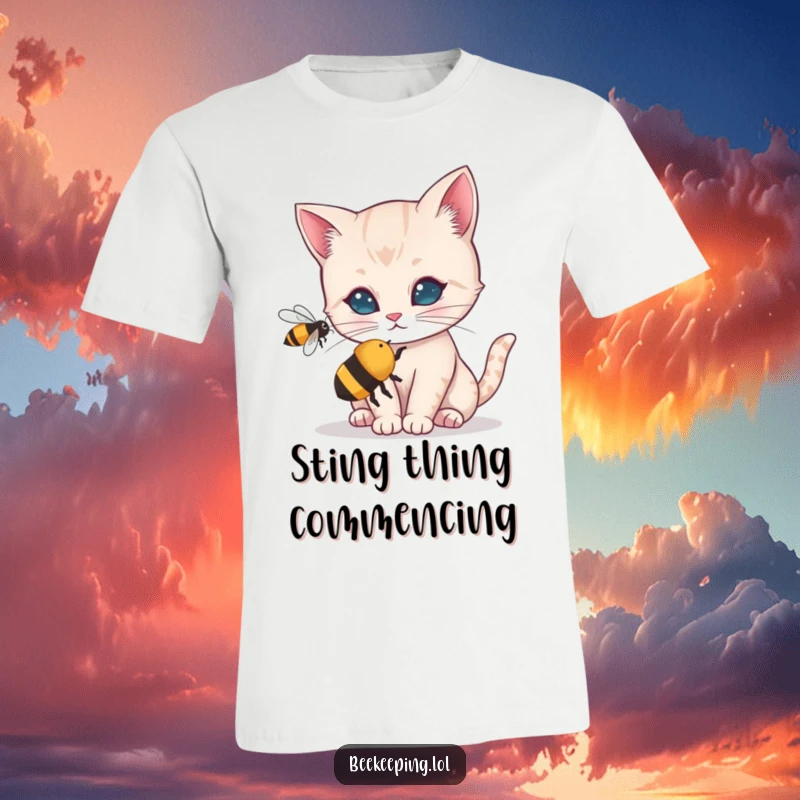 Funny T-shirt with a curious cat's face close to a buzzing bee, showcasing intense feline investigation. A humorous and lighthearted design.