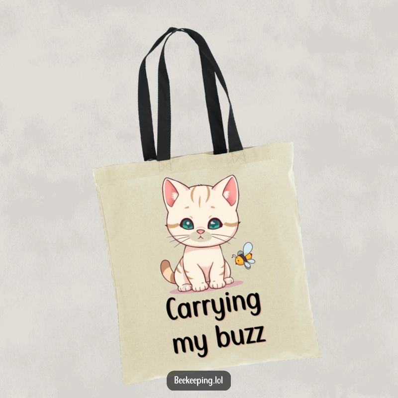Funny cat tote bag with a curious cat observing a buzzing bee, perfect for everyday use and humor.